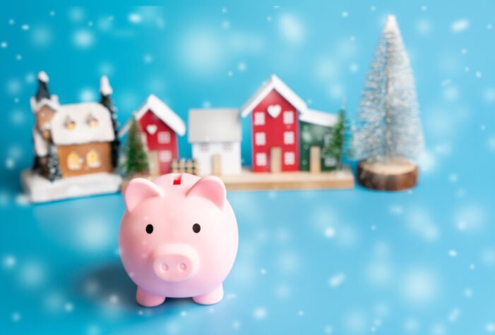 Piggy,Bank,,Christmas,Tree,And,Houses.,Winter,Budget,For,The Christmas on a budget